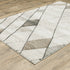 3' X 5' Beige Grey Tan And Brown Geometric Power Loom Stain Resistant Area Rug